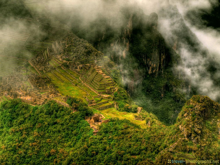 machu picchu from huyana picchu clouds